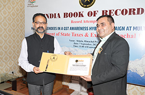 Principal Secy Panda with Bhanu Pratap from India Book of Records 