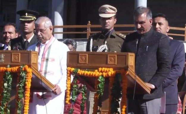 Congress leader Sukhvinder Singh Sukhu takes an oath as CM at Shimla from Guv Arlekar