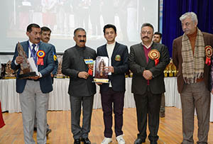 CM Sukhu flanked by EM Rohit  and MLA Janartha 