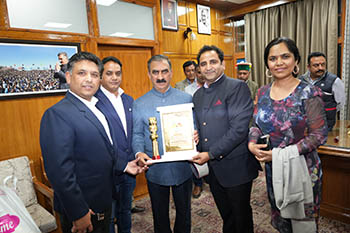 CM Sukhu with HP Global Pravasi members in Shimla 