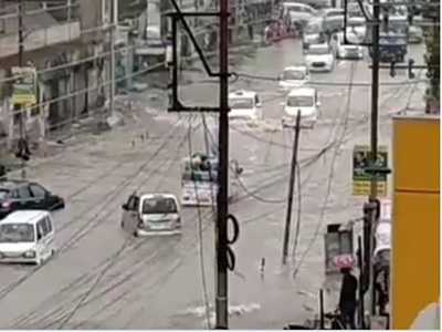 View of vehicles navigating in four ft deep pools of water 