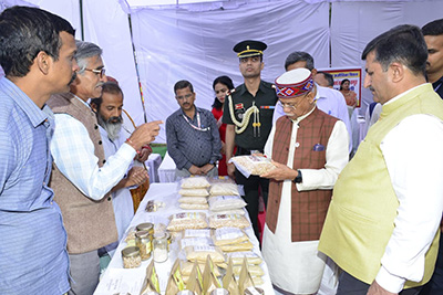 HP Guv at Palampur inspecting exhibition on Millets 