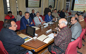 Aush Minister with officers at a meeting in Shimla 