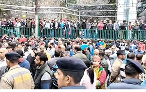 People gathering outside the counting Centre in Shimla on May 4, 2023 