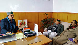 Col Shandil with Anirudh Singh and Chander Kumar in a meeting on Nari Saman scheme in Shimla 