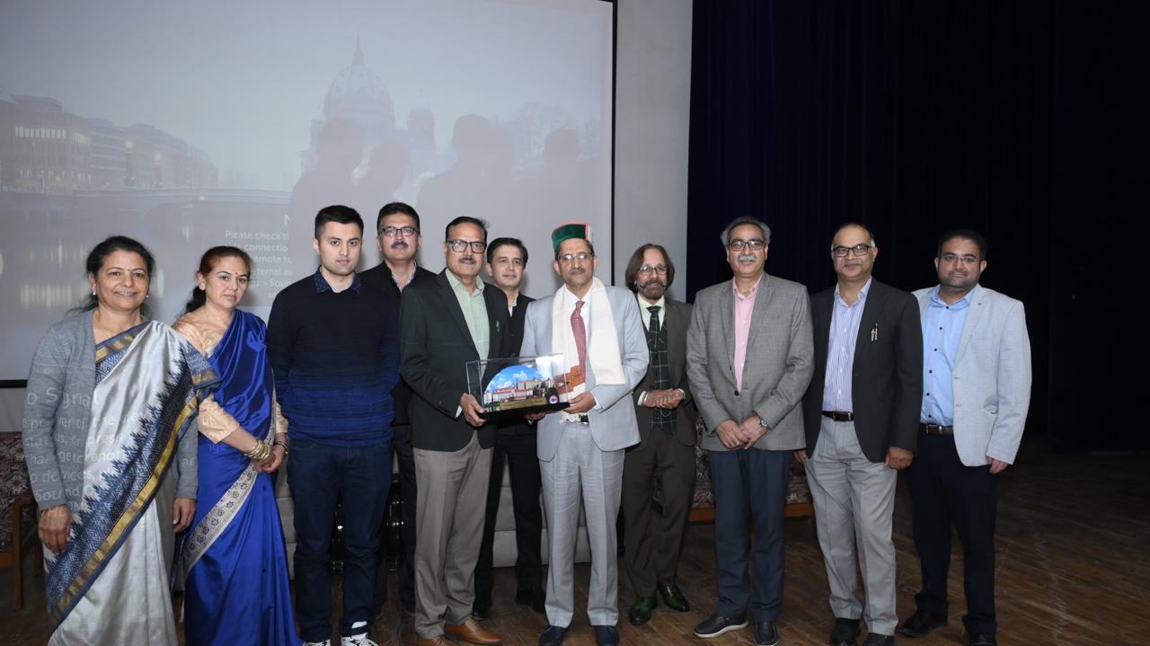 Dr PC Negi in green cap being facilitated at the IGMC Shimla 