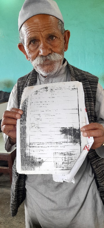 Tayan Ram dalit with land letter in Chopal town of Shimla district 