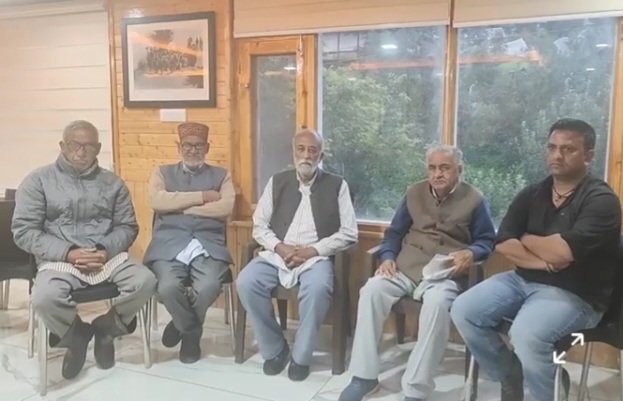 Kotgarh veteran Hari Roach with Singha 