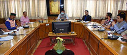 DC Shimla Aditya Negi at meeting with SDMs and apple growers in Shimla on Friday 